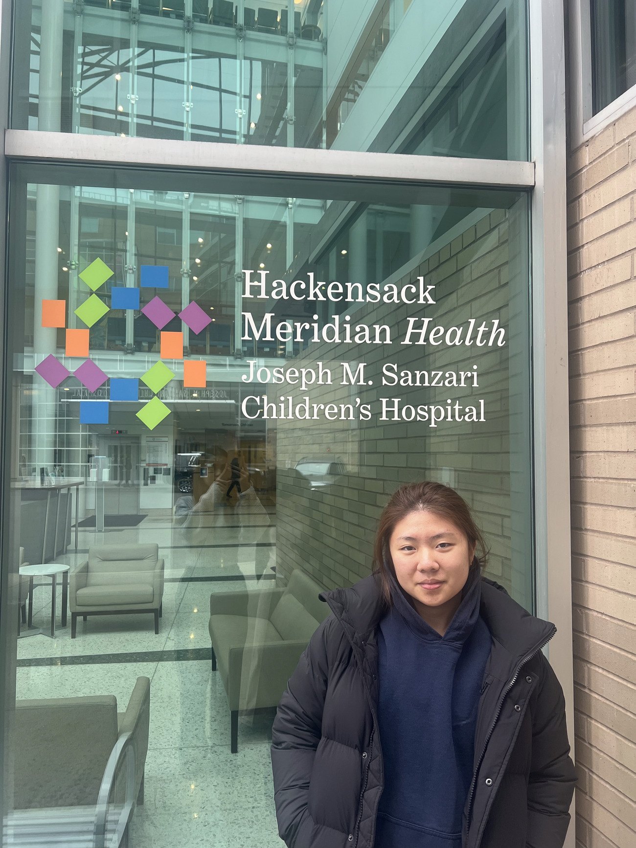Claire Jiang outside Joseph M. Sanzari Children's Hospital